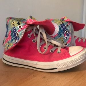 Neon pink high top converse